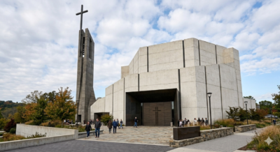 Does America At The Crossroads Put Your Soul At The Crossroads? Large modern church with a cross on the steeple and on the large iron doors.
